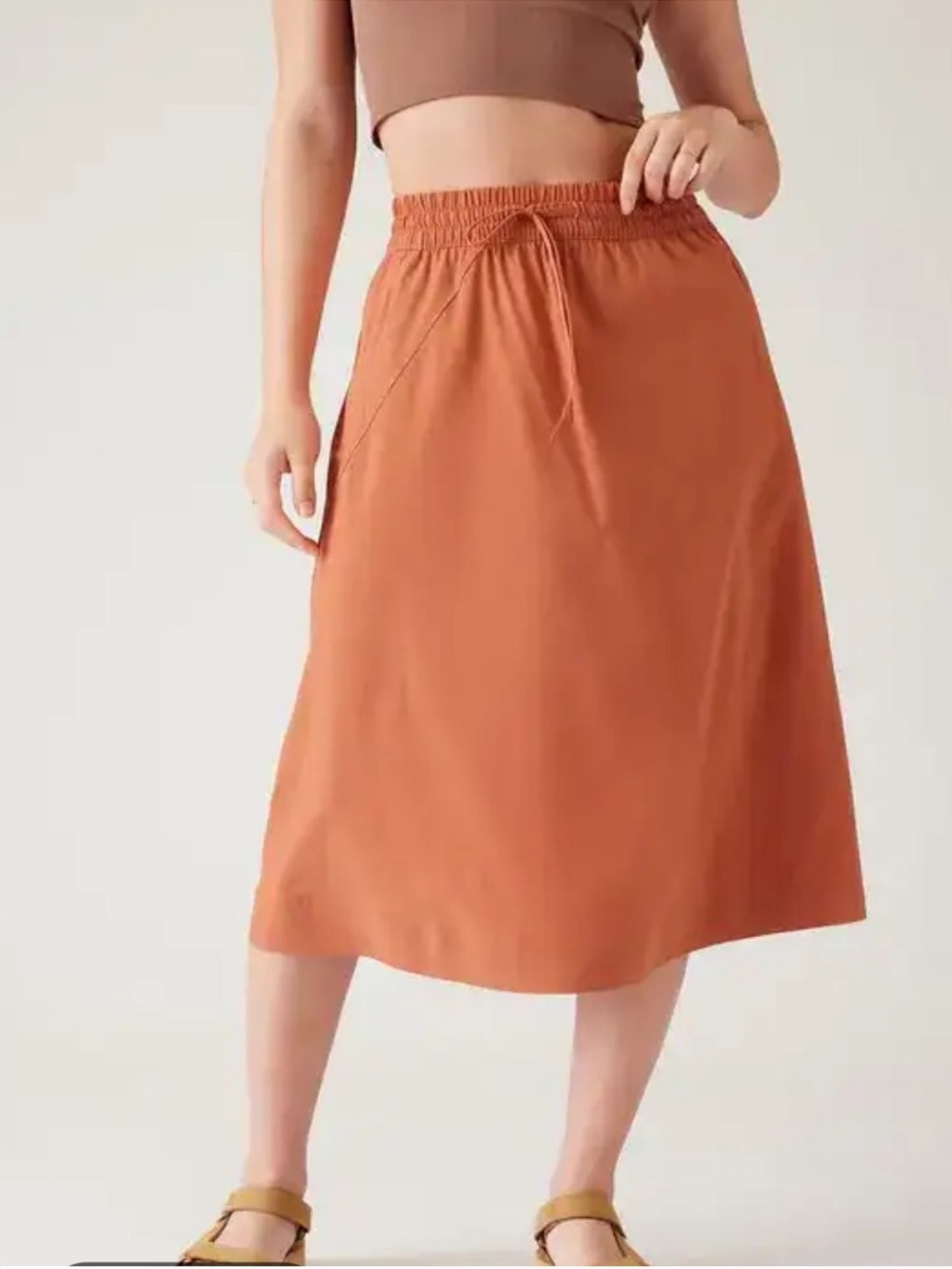 Athleta Women’s Arrival Skirt in a rust-orange shade in a Size 16